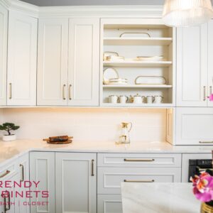 Sleek bright white kitchen cabinets with modern handles