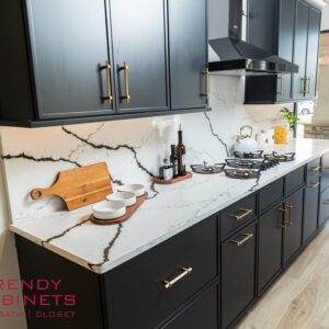 Luxury black cooktop integrated into kitchen cabinets
