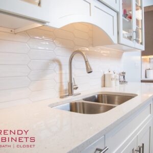 Contemporary kitchen faucet with stainless steel sink